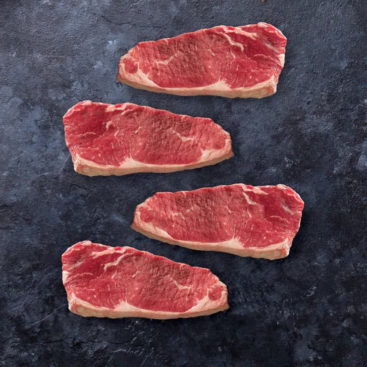 Kansas City Steak Co. USDA Choice NY Strip Steaks 16 oz. Each (Available in 4, 8, or 12 Packs) — product image 1
